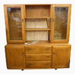 Ercol elm side cabinet, the raised top with pair glazed display cupboards flanking two shelves,
