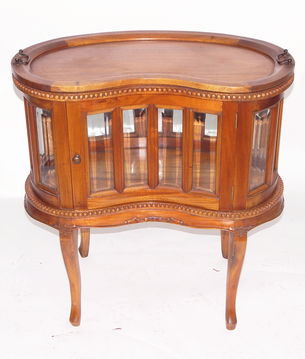Walnut kidney-shaped drinks cabinet with loose tray top,