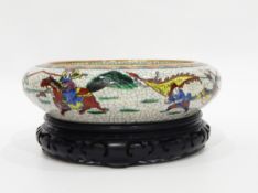 Japanese crackleware dish, shallow with inverted rim, painted with dragon to centre and autour,