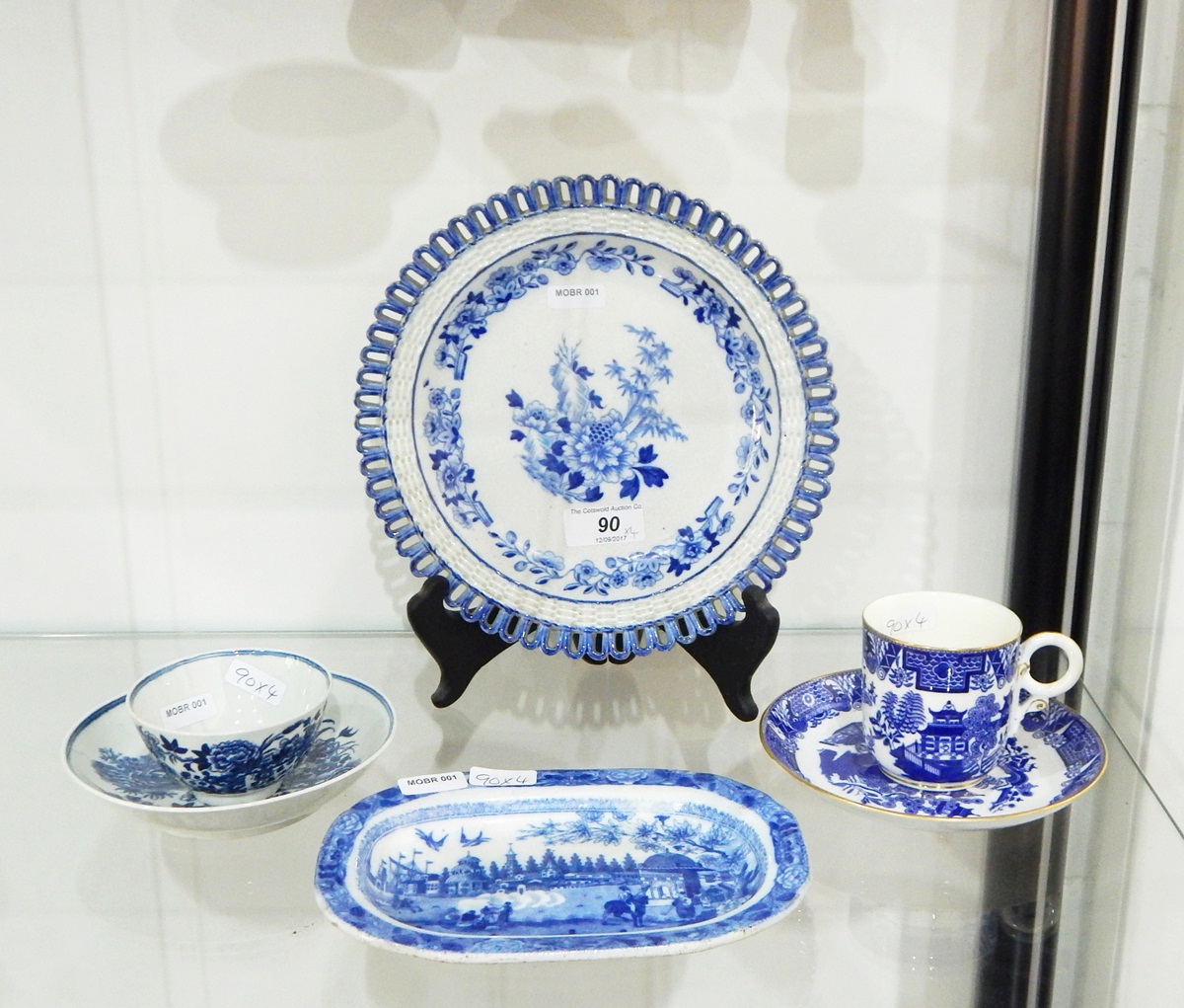 Blue and white 'Semi-China' plate with central floral spray in the chinoiserie style,