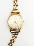 Lady's gold coloured Tissot bracelet watch,