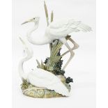 Lladro porcelain model of a pair of cranes amongst reeds,