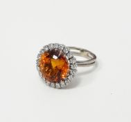 White metal diamond and citrine dress ring,