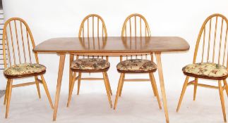 Ercol elm dining table and a set of six Ercol elm seated and beech stickback chairs