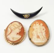 Victorian black enamel crescent brooch set with central seedpearl,