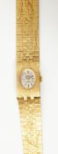 Imado lady's gold plated dress watch with oval silvered dial,