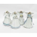 Lladro porcelain set of angels playing instruments and one singing, each 18cm high approx.