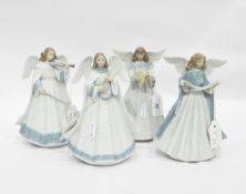 Lladro porcelain set of angels playing instruments and one singing, each 18cm high approx.