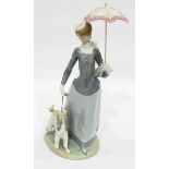 Lladro figure of woman wearing scarf and holding umbrella and with Afghan hound,