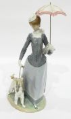 Lladro figure of woman wearing scarf and holding umbrella and with Afghan hound,