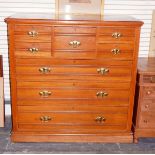 Edwardian satin walnut chest of drawers having five small drawers over three graduated long drawers,