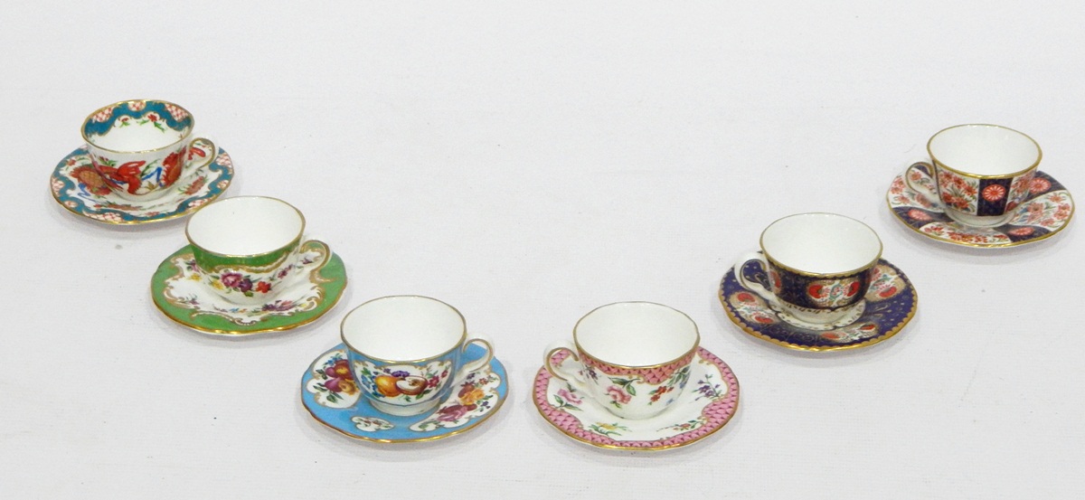 Six various boxed Royal Worcester miniature cups and saucers including 'Jabberwocky', 'Wheatsheaf',