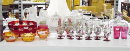 Suite of glasses with enamel overlay with matching lidded storage pots,