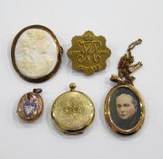 Victorian gold-coloured locket with engraved and enamel decoration,
