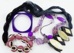 Large quantity of costume jewellery including bead necklaces, shell pendants,