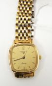 Lady's gold plated Longines quartz bracelet watch on brick-link bracelet