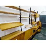 Ladderax-style storage unit comprising four storage blocks fitted with cupboards,