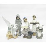 Collection of Nao by Lladro porcelain models to include panda, girl looking out to sea, baker boy,