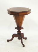 Victorian walnut sewing table of octagonal form,