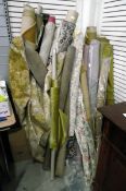 Large quantity of upholstery and curtain fabrics, all on rolls,