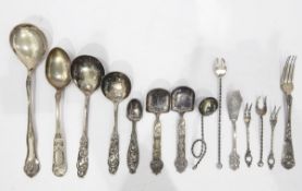 830 standard white metal spoon decorated with stylised trees, with a bird above,