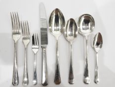 Suite of Postons Lonsdale silver plate flatware comprising table forks, dessert forks, table knives,