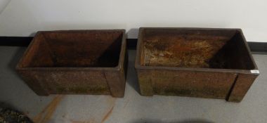 Pair of cast iron garden planters of rectangular form,