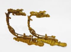 Pair of gilt metal curtain tie-back brackets modelled as quivers of arrows,