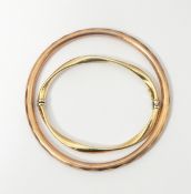 9ct rose gold slave bangle of faceted design, 11g approx.