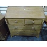 Pine bureau, the interior fitted the usual pigeonholes and small drawers,