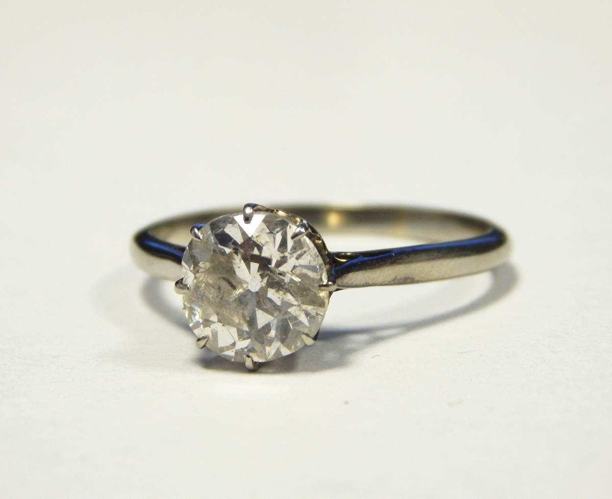 White metal diamond solitaire ring, the old brilliant cut diamond measuring approx. 7.5 to 7.