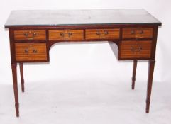 Edwardian mahogany dressing table having an arrangement of six small drawers to kneehole surround