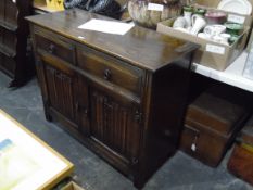 Oak reproduction dresser, the upper section having two plate racks,