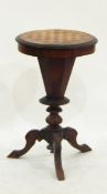 Victorian walnut sewing/games table, the circular hinged top with parquetry inlaid games board,