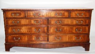 Mahogany dressing chest having an arrangement of nine drawers,