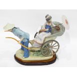 Lladro figure group of Chinese man pulling lady in rickshaw, complete with umbrella,