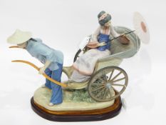 Lladro figure group of Chinese man pulling lady in rickshaw, complete with umbrella,