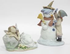 Lladro model of fairy sleeping on rock by flowers and another of a girl building snowman,