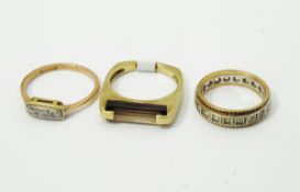 Three-stone diamond ring set with eight cut diamonds, marked 9ct and PT,