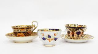 Crown Derby Imari pattern cup and saucer and another similar cup and saucer and another similar