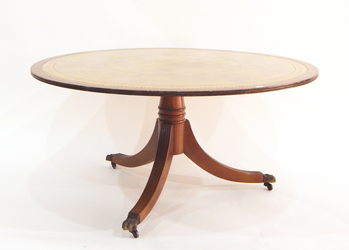 Mahogany circular occasional table raised on turned pedestal with reeded swept tripod supports,