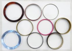 Large quantity of costume jewellery bangles including mother-of-pearl examples, enamel examples,