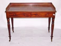 19th century mahogany washstand having three-quarter gallery over two drawers with turned knob