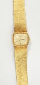 Lady's gold Girard-Peregaux bracelet watch with integral woven bracelet,