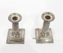 Pair of Victorian silver candlesticks by James Deakin & Sons, Sheffield 1897, of column design,