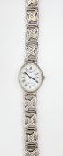 Lady's silver Rotary Elite bracelet watch with oval mother-of-pearl dial and integral Celtic
