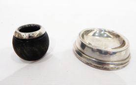 Silver ashtray of circular form with filled base and a silver vesta case with turned wooden body