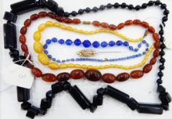 Quantity of vintage plastic and glass bead necklaces including graduated simulated amber examples