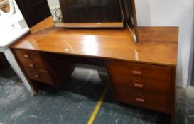 Circa 1970's teak kneehole dressing table,