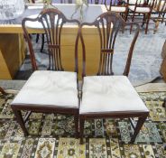 Pair of Georgian mahogany dining chairs with inlaid decoration and pierced splats and a pair of